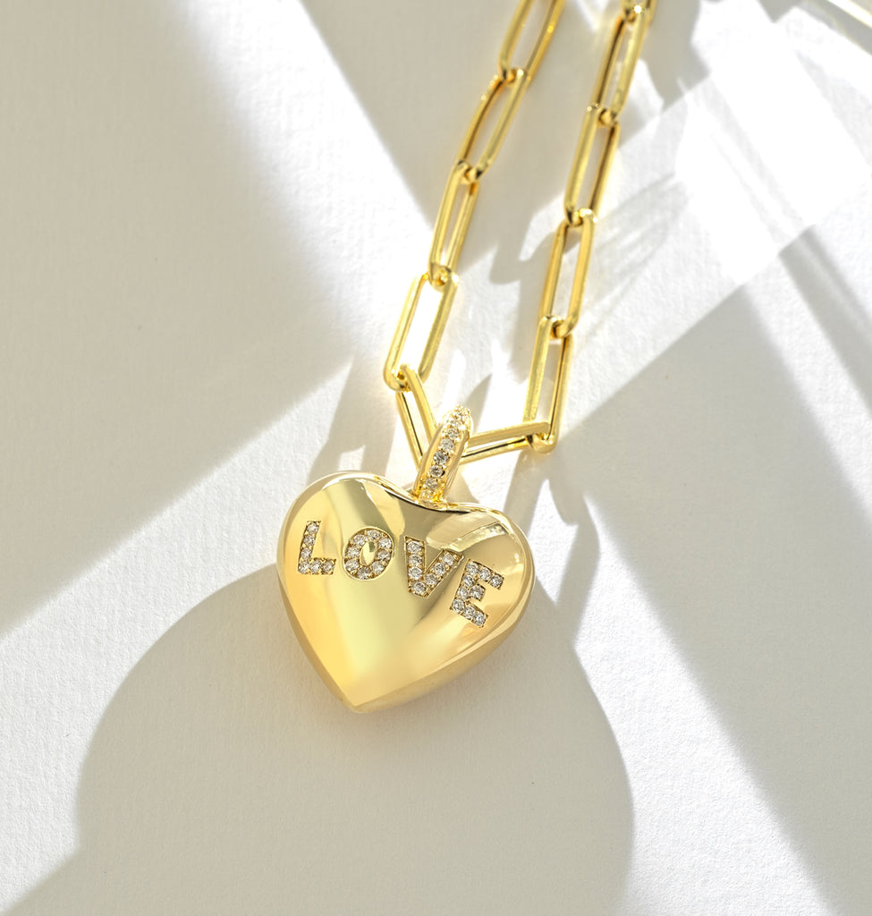 CIONDOLO IN ORO GIALLO CON CUORE E SCRITTA DI DIAMANTI