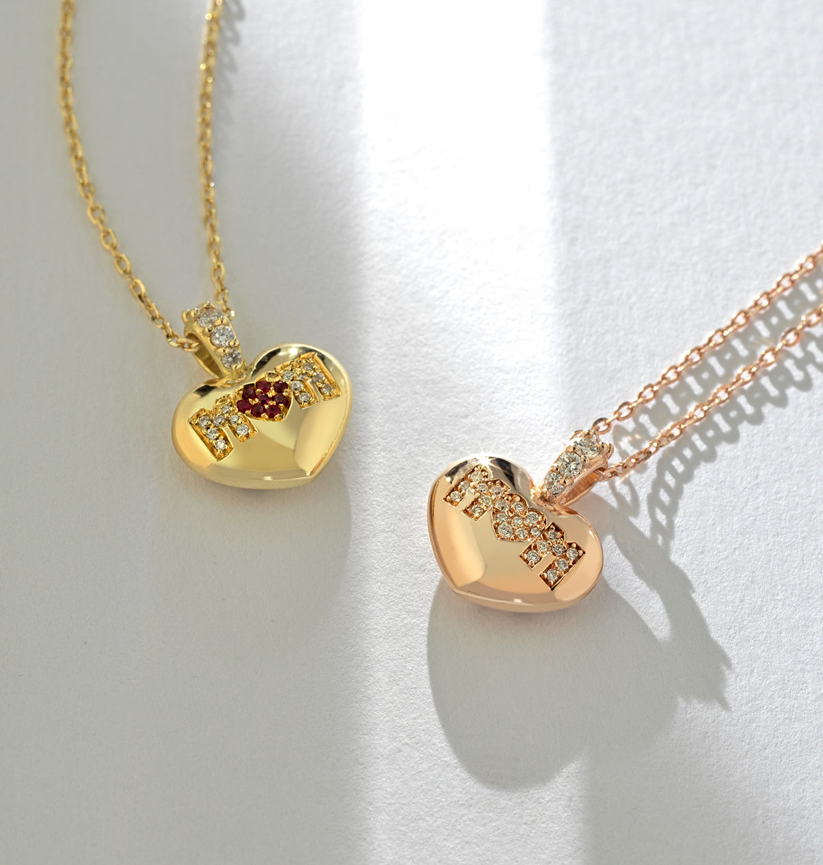 CIONDOLO IN ORO GIALLO CON CUORE DI DIAMANTI E RUBINI