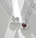 CIONDOLO IN ORO BIANCO CON CUORE DI DIAMANTI E RUBINI