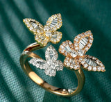 ANELLO IN ORO ROSA CON FARFALLE BICOLORE DIAMANTI E BAGUETTE