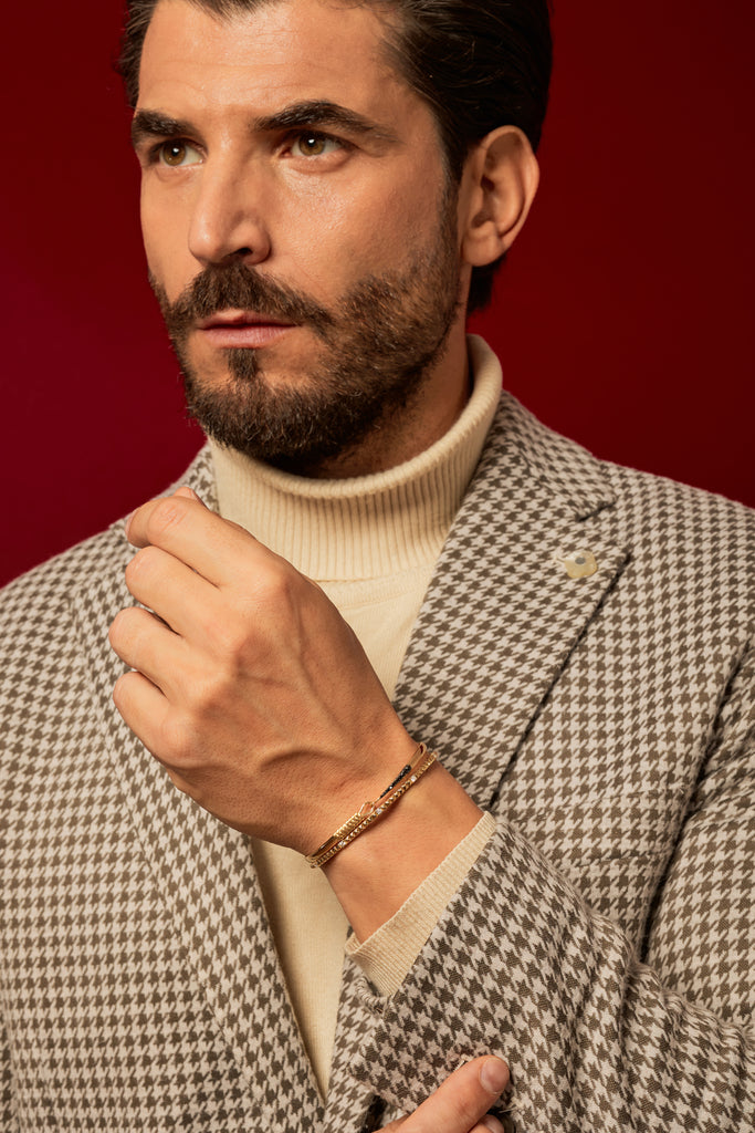 BRACCIALE RIGIDO IN ORO GIALLO CON DIAMANTI