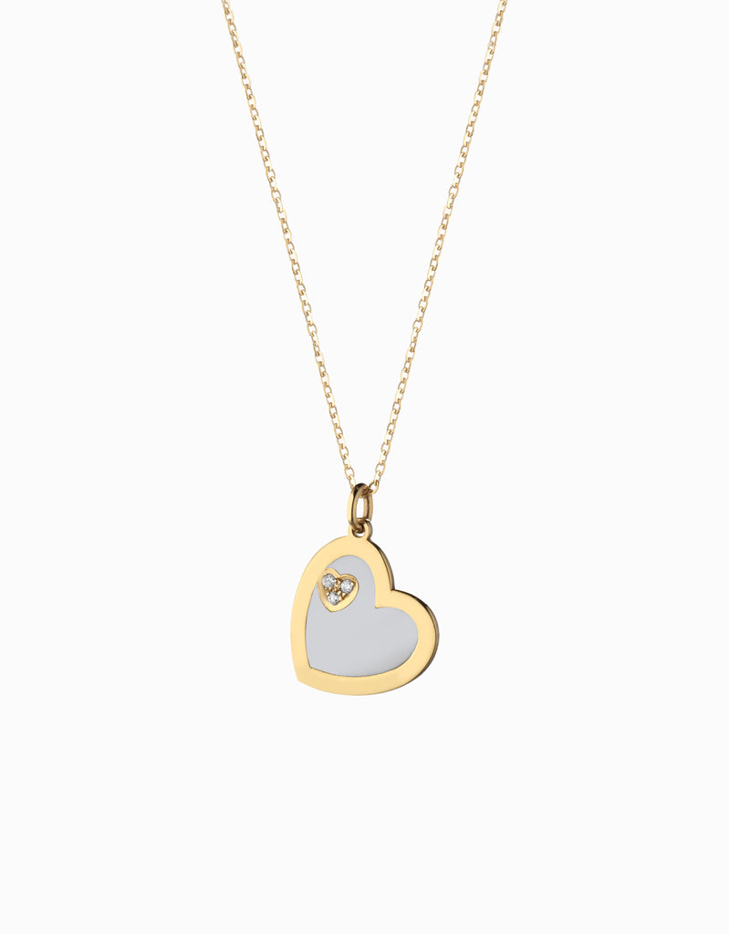 ciondolo a cuore con smalto bianco in oro giallo e diamanti