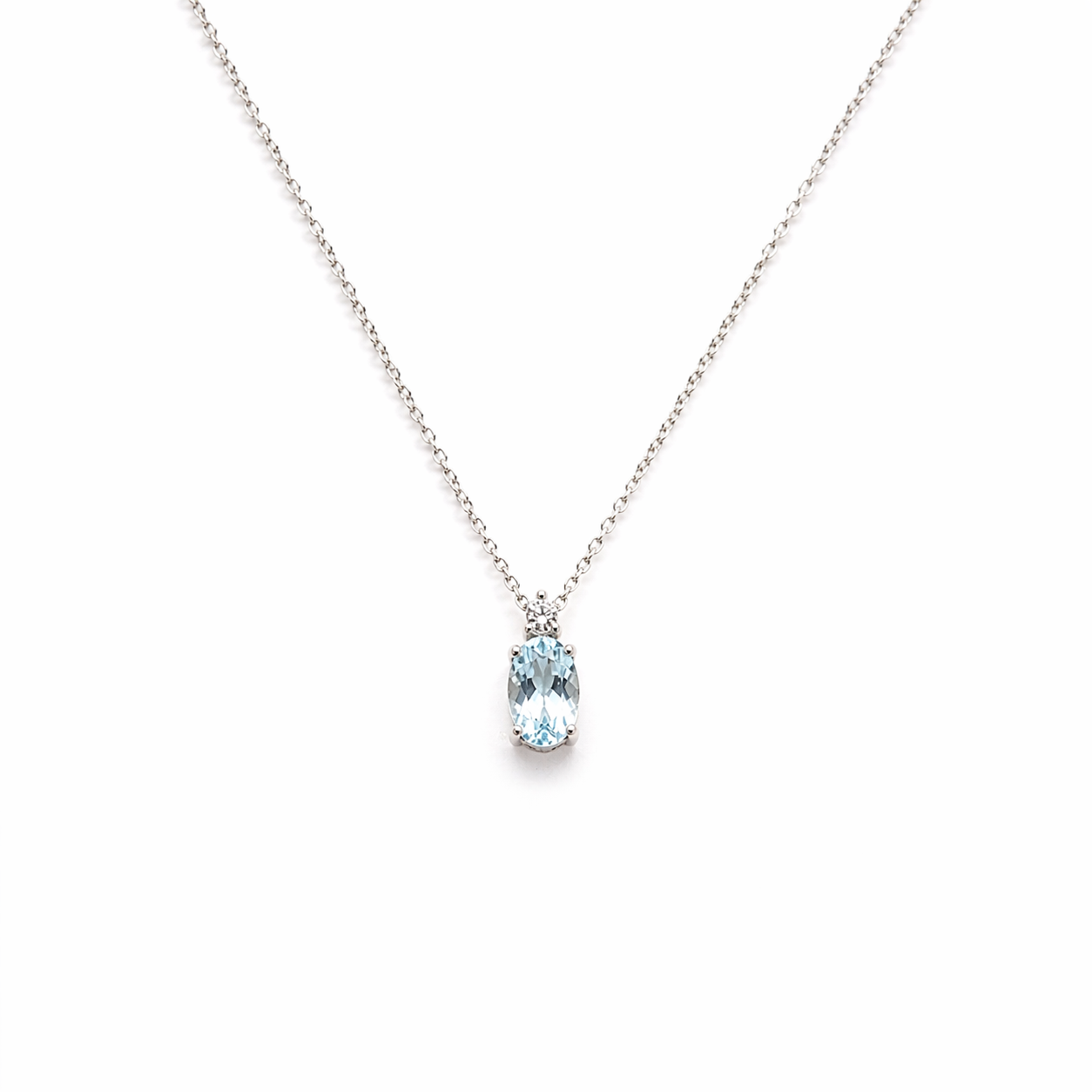 CIONDOLO IN ORO 9KT, ORO BIANCO CON DIAMANTINO E ACQUAMARINA OVALE