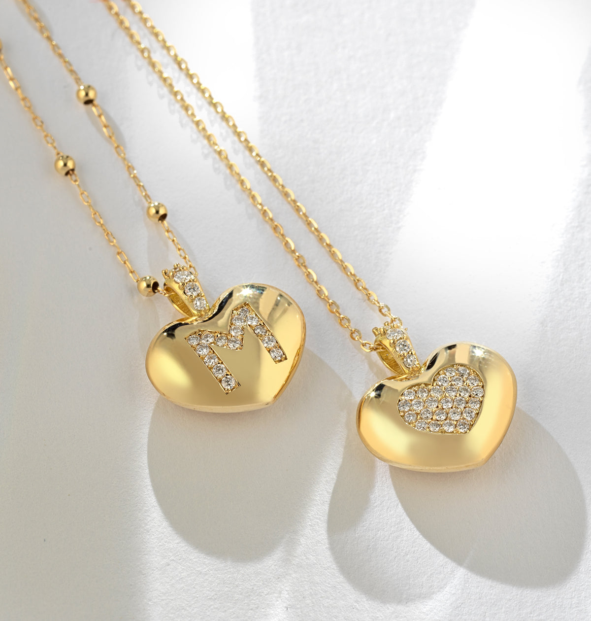 CIONDOLO IN ORO GIALLO CON CUORE DI DIAMANTI