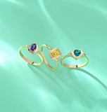 ANELLO IN ORO ROSA CON CUORE TOPAZIO BLU  E DIAMANTINI