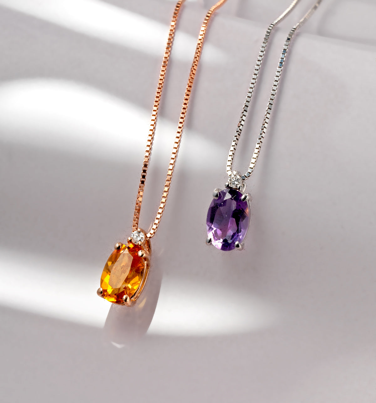 CIONDOLO CON CITRINO CENTRALE IN ORO ROSA CON DIAMANTINO