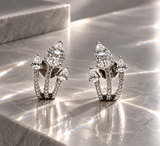 ORECCHINI IN ORO BIANCO CON GOCCE DI DIAMANTI E BAGUETTE