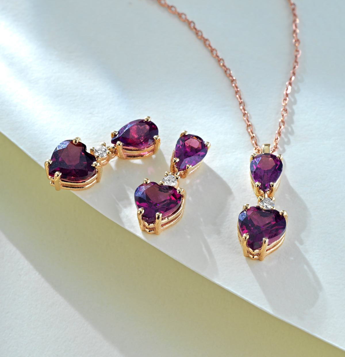 CIONDOLO IN ORO ROSA CON GOCCIA E CUORE AMETISTA E DIAMANTINO CENRTRALE