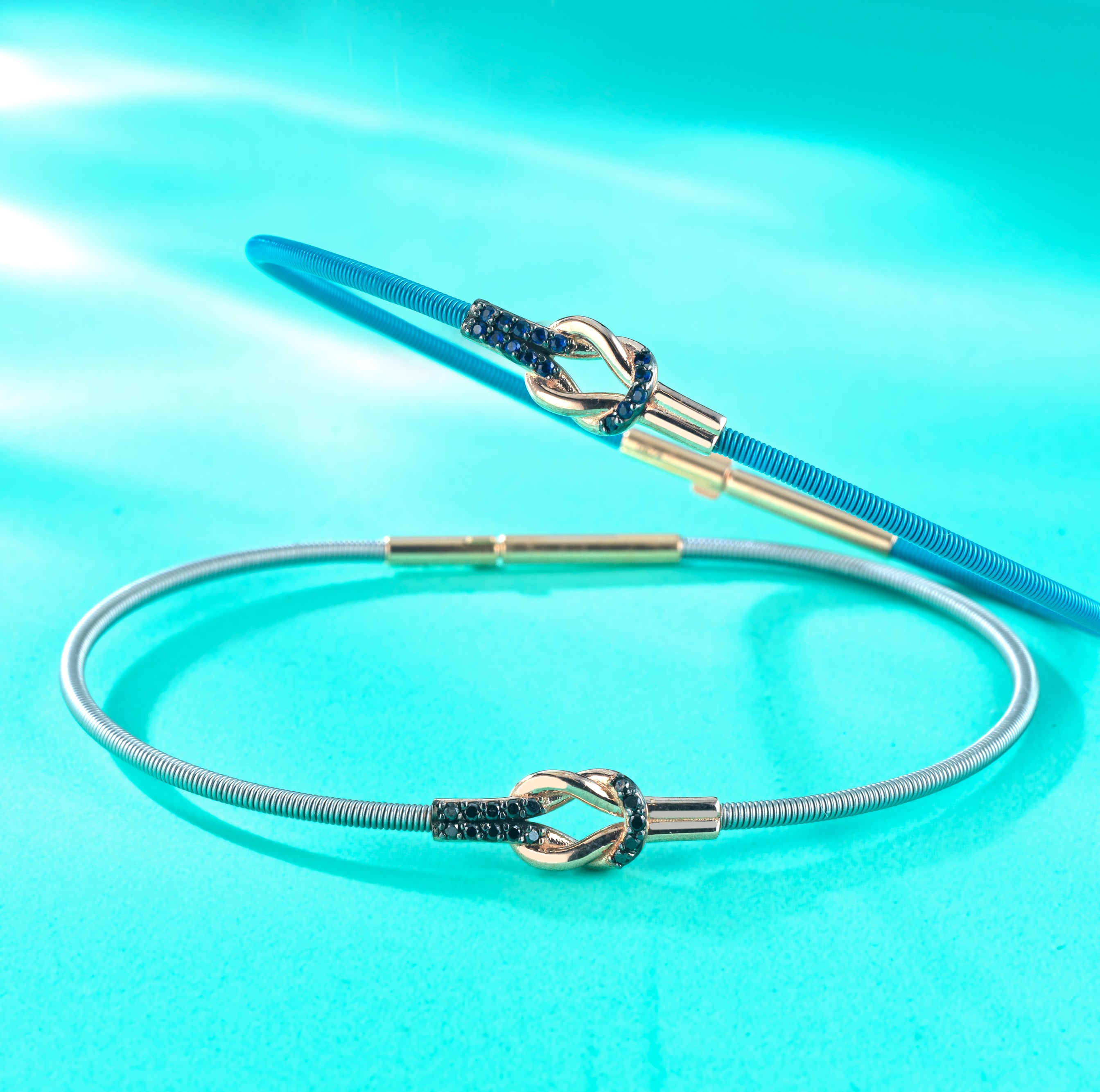 BRACCIALE BLU IN ORO ROSA CON ZAFFIRI CENTRALE