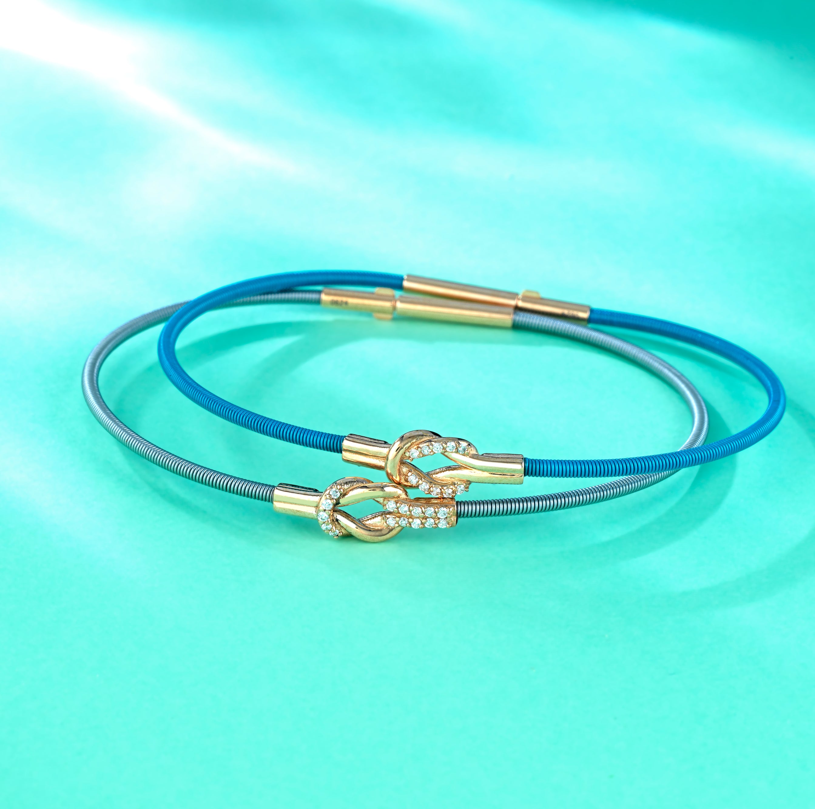 BRACCIALE GRIGIO IN ORO ROSA CON DIAMANTI CENTRALE