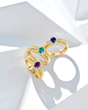 ANELLO CON FASCIA STRETTA IN ORO GIALLO CON OVALE DI DIAMANTI E ZAFFIRO CNETRALE