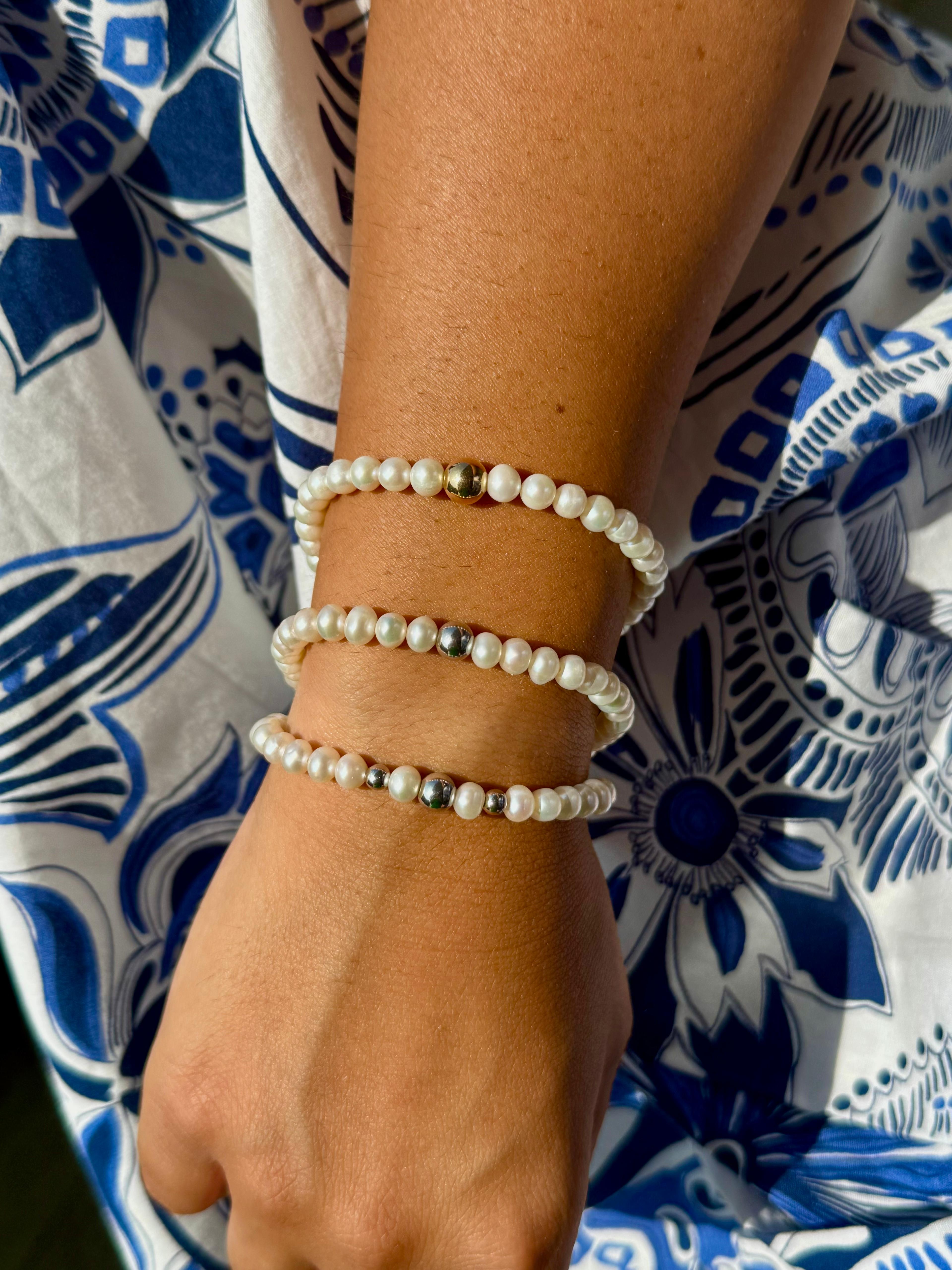 BRACCIALE PERLA CON PALLINA CENTRALE IN ORO BIANCO E CHIUSURA