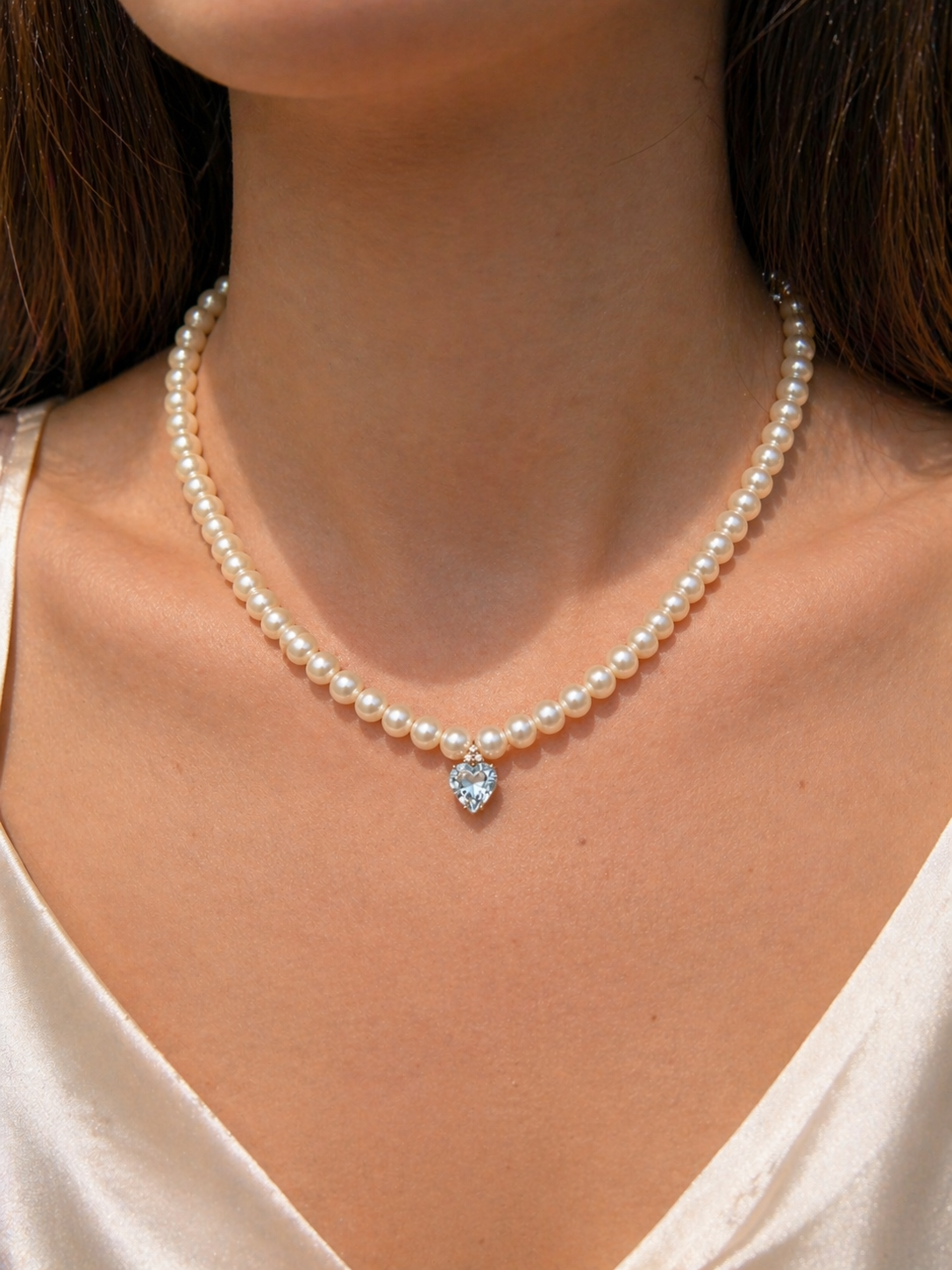 COLLANA IN ORO 9KT, ORO ROSA CON DIAMANTINI E CUORE ACQUAMARINA