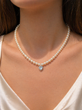 COLLANA IN ORO 9KT, ORO ROSA CON DIAMANTINI E CUORE ACQUAMARINA