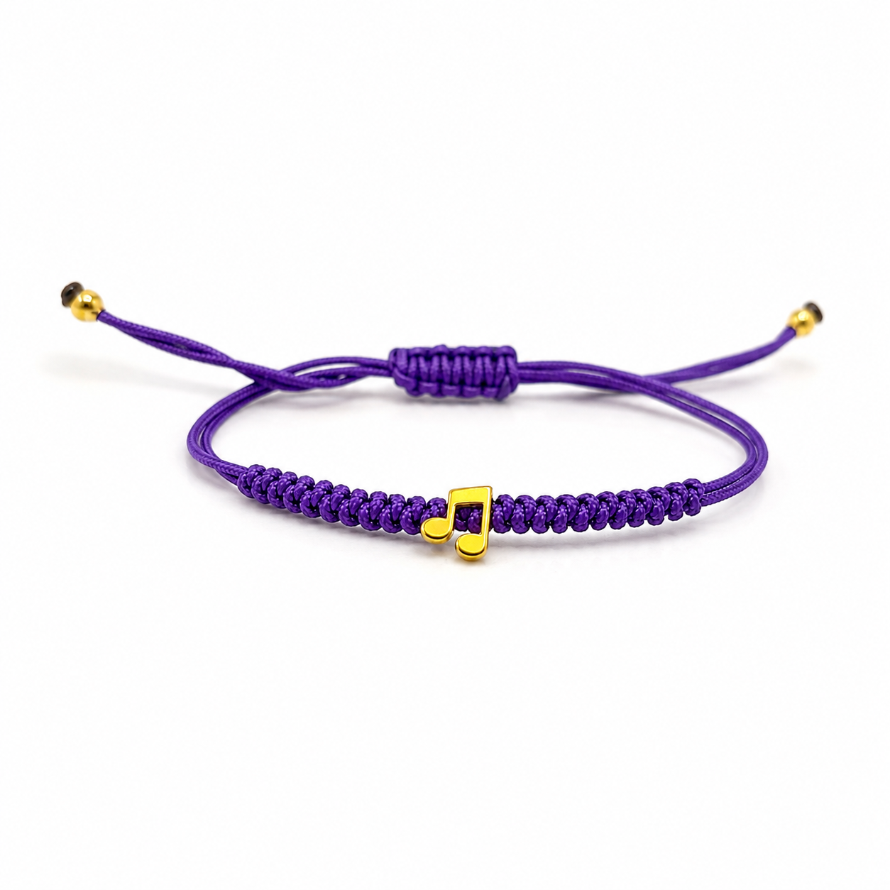 BRACCIALE CON CORDINO VIOLA E NOTA MUSICALE IN ORO GIALLO