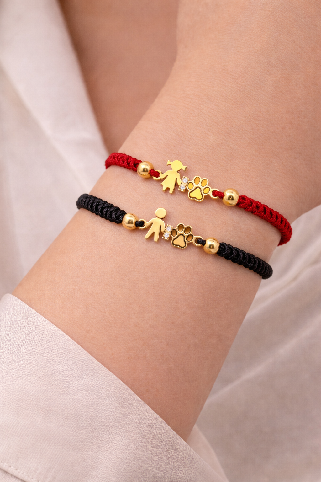 BRACCILE IN ORO ROSA, 9KT BIMBO E ZAMPA CON DUE DIAMANITINI