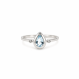 ANELLO IN ORO 9KT, BIANCO CON DIAMANTINI LATERALI E GOCCIA ACQUAMARINA