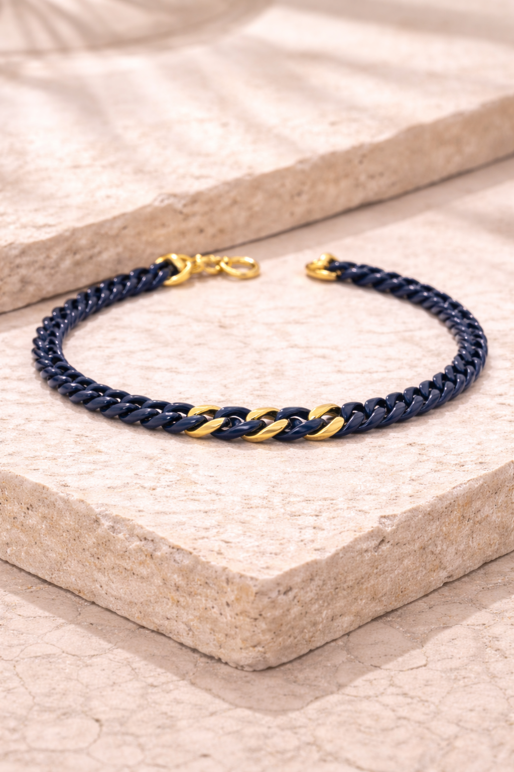 BRACCIALE IN CERAMICA BLU CON GRUMETTE CENTRALI E CHIUSURA IN ORO 9KT