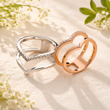 ANELLO IN ORO BIANCO A FASCIA CON  DIAMANTI