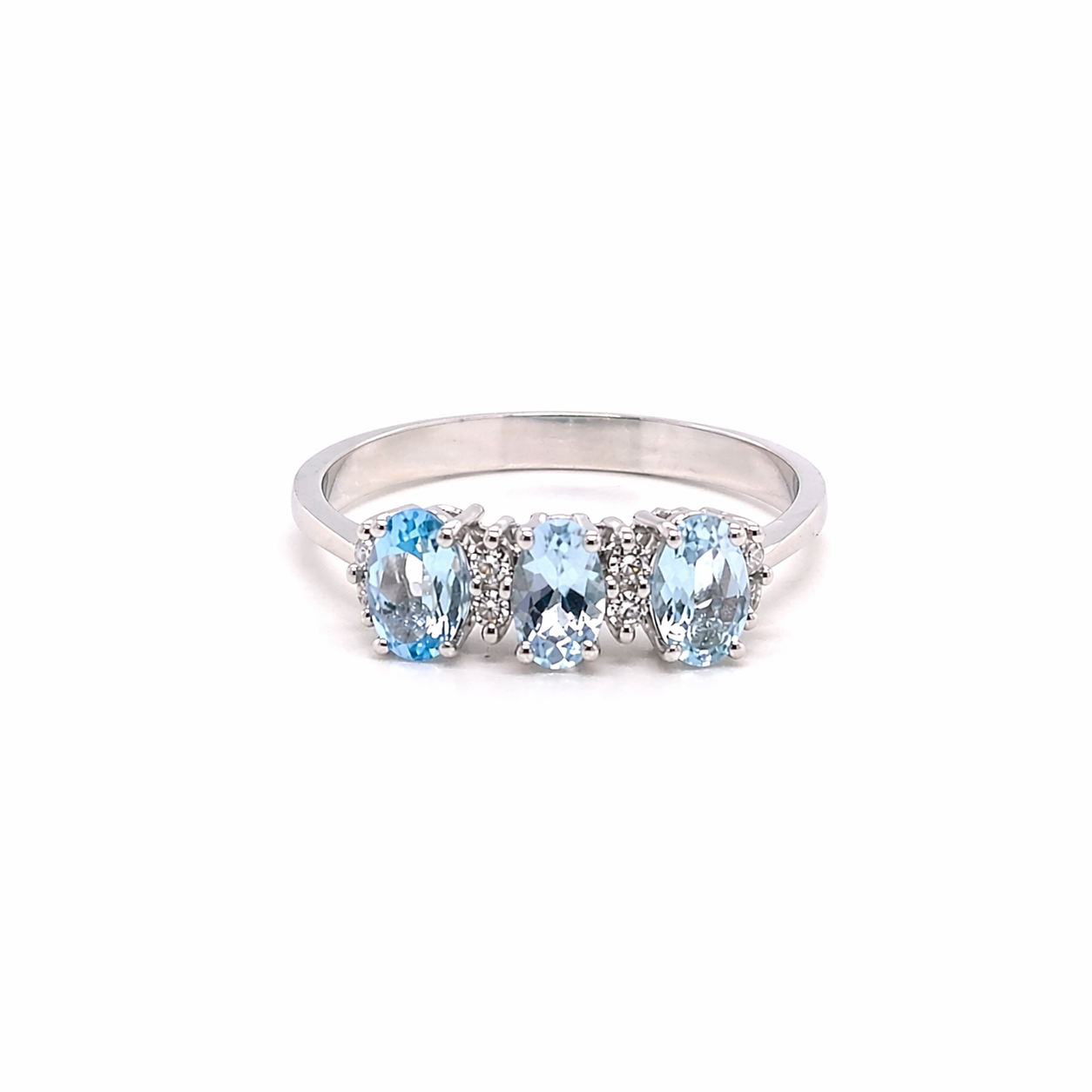 ANELLO TRILOGY IN ORO 9KT, CON DIAMANTINI E ACQUAMARINA OVALI