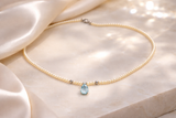 COLLANA PERLE IN ORO 9KT, CON DIAMANTINO E ACQUAMARINA GOCCIA CENTRALE