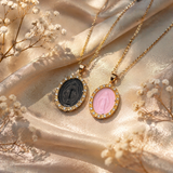 COLLANA IN ORO GIALLO CON CERAMICA ROSA ALL'INTERNO CON MADONINNA  E DIAMANTI INTORNO