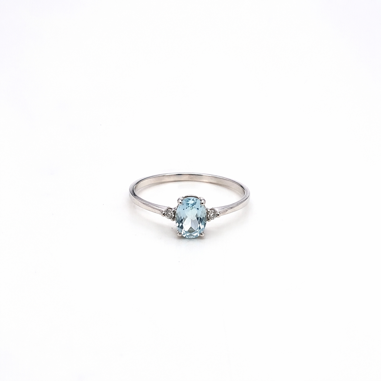 ANELLO IN ORO 9KT, ORO BIANCO CON DIAMANTINI LATERALI E OVALE ACQUAMARINA