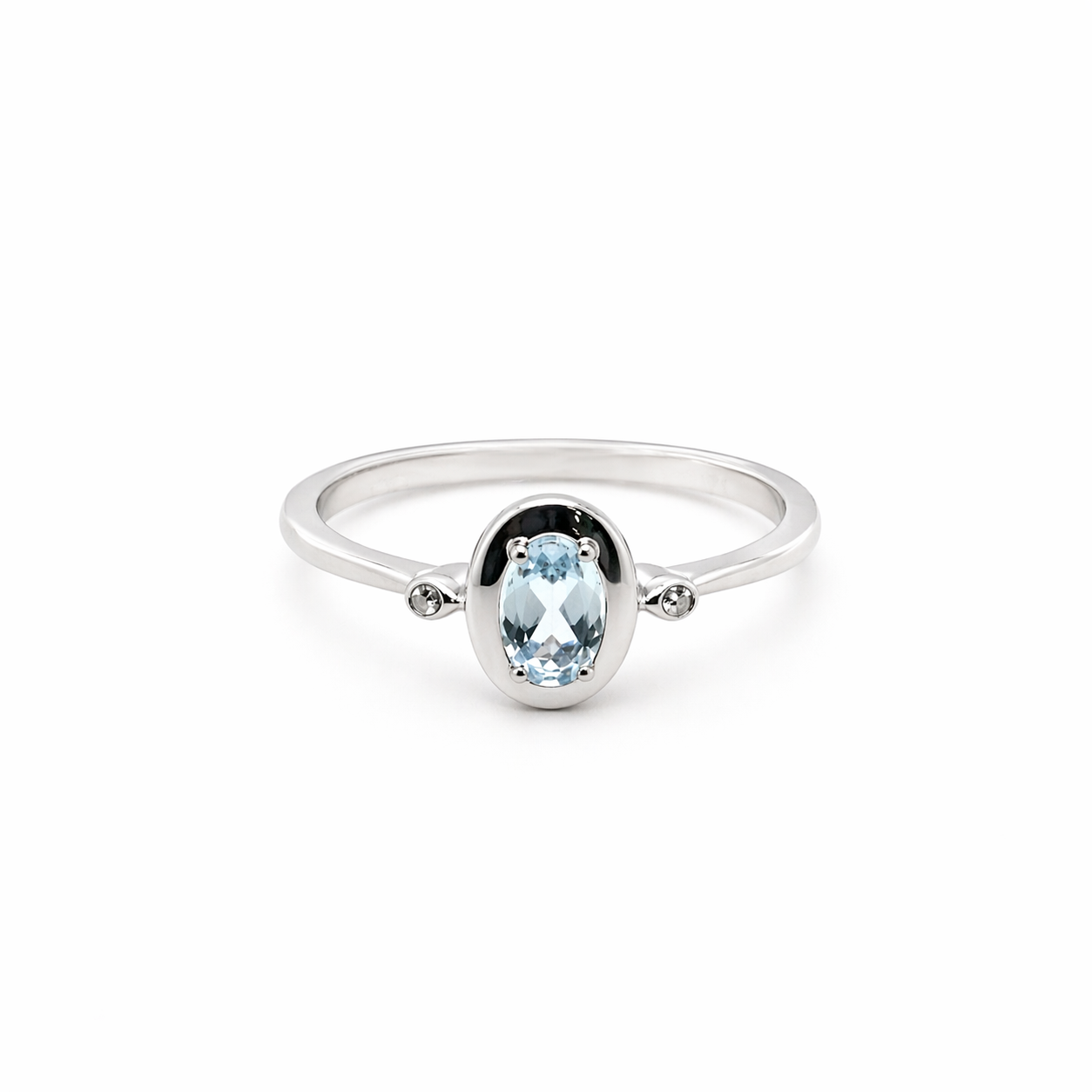 ANELLO IN ORO 9KT, BIANCO CON DIAMANTINI LATERALI E OVALE ACQUAMARINA