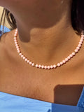 COLLANA CON PASTA DI CORALLO ROSA IN ORO GIALLO E PALLINE ALTERNATE