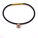 BRACCIALE CON CINTURINO NERO IN ORO ROSA CON FIORE DIAMANTI E AMETISTA CENTRALE