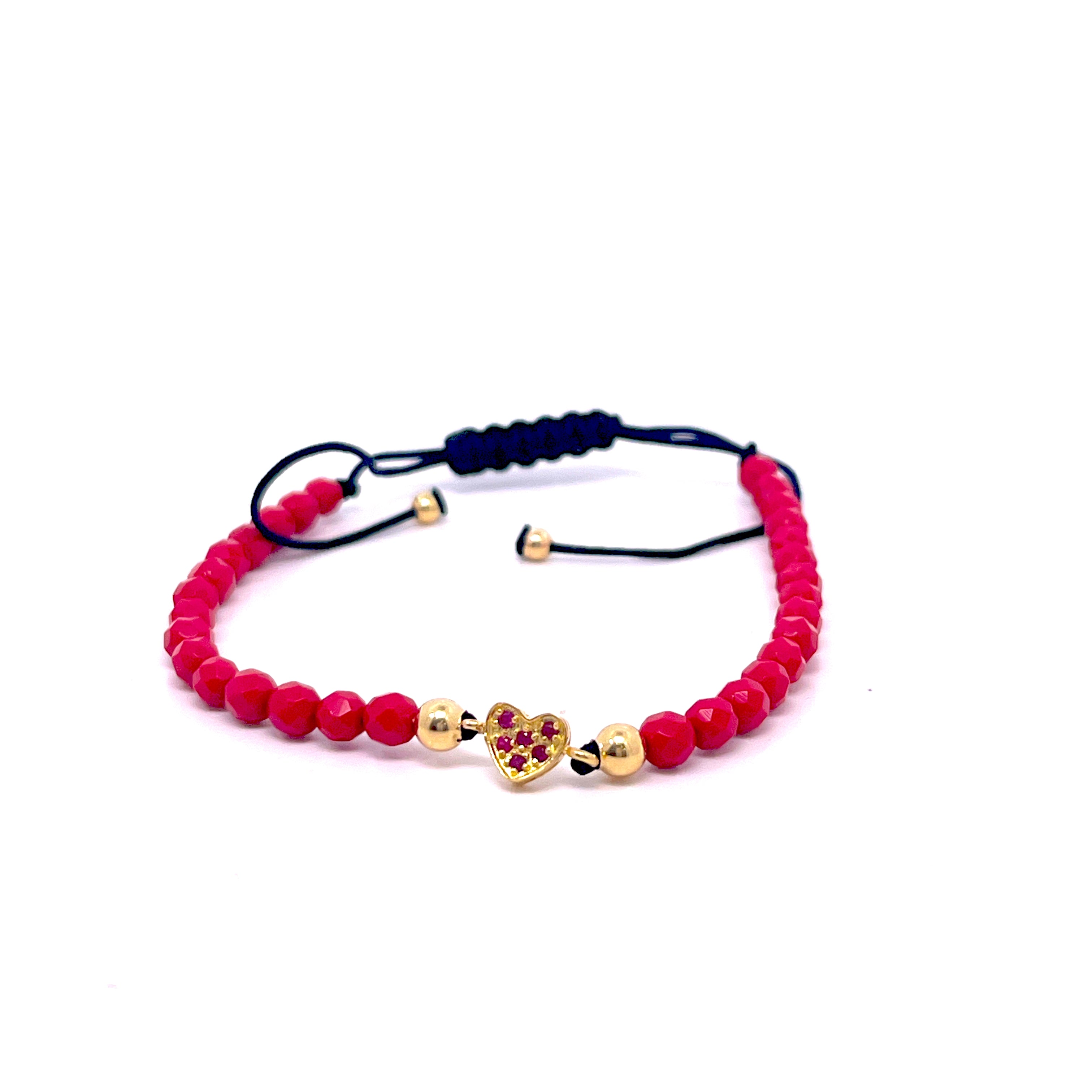 BRACCIALE CON CUORE CENTRALE E RUBINI IN ORO GIALLO ED EMATITE