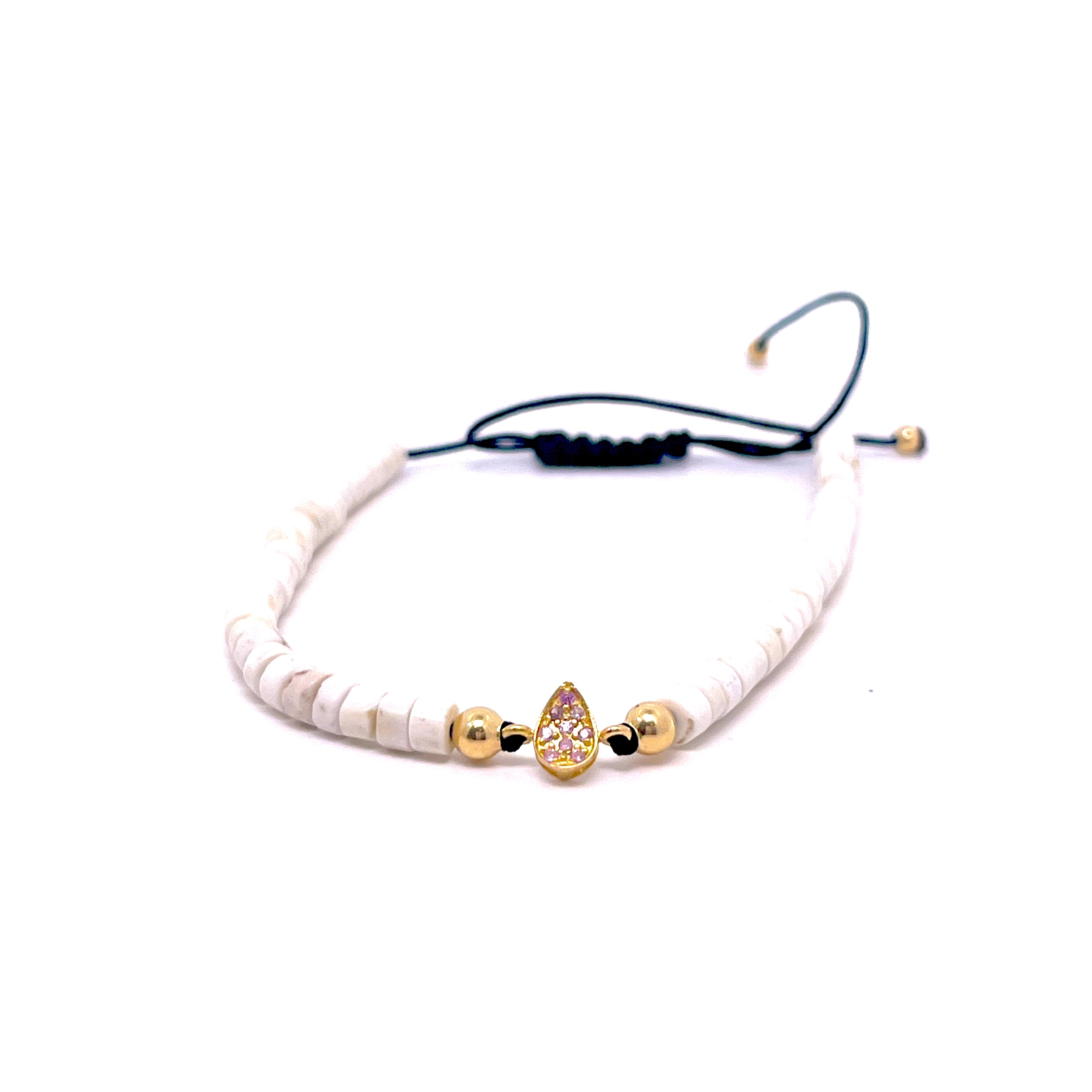 BRACCIALE CON GOCCIA CENTRALE E ZAFFIRI ROSA  IN ORO GIALLO ED EMATITE