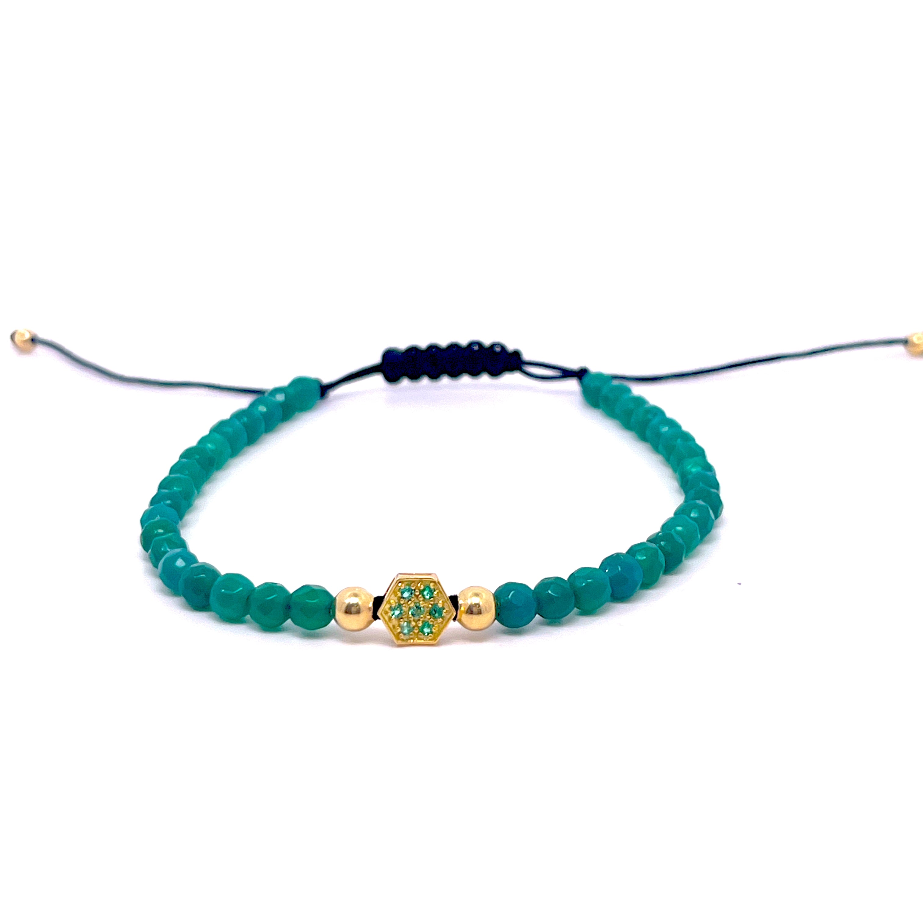 BRACCIALE CON ESQAGONO CENTRALE E SMERALDI  IN ORO GIALLO ED EMATITE