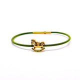 BRACCIALE CAVALLUCCIO A DONDOLO IN ORO GIALLO CON SMERALDI  E DIAMANTI 9KT