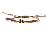 BRACCIALE IN ORO ROSA, 9KT CON BIMBO E CANE, DUE DIAMANTINI