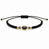 BRACCIALE LACCIO IN ORO GIALLO CON CENTRALE NERO E DIAMANTINI