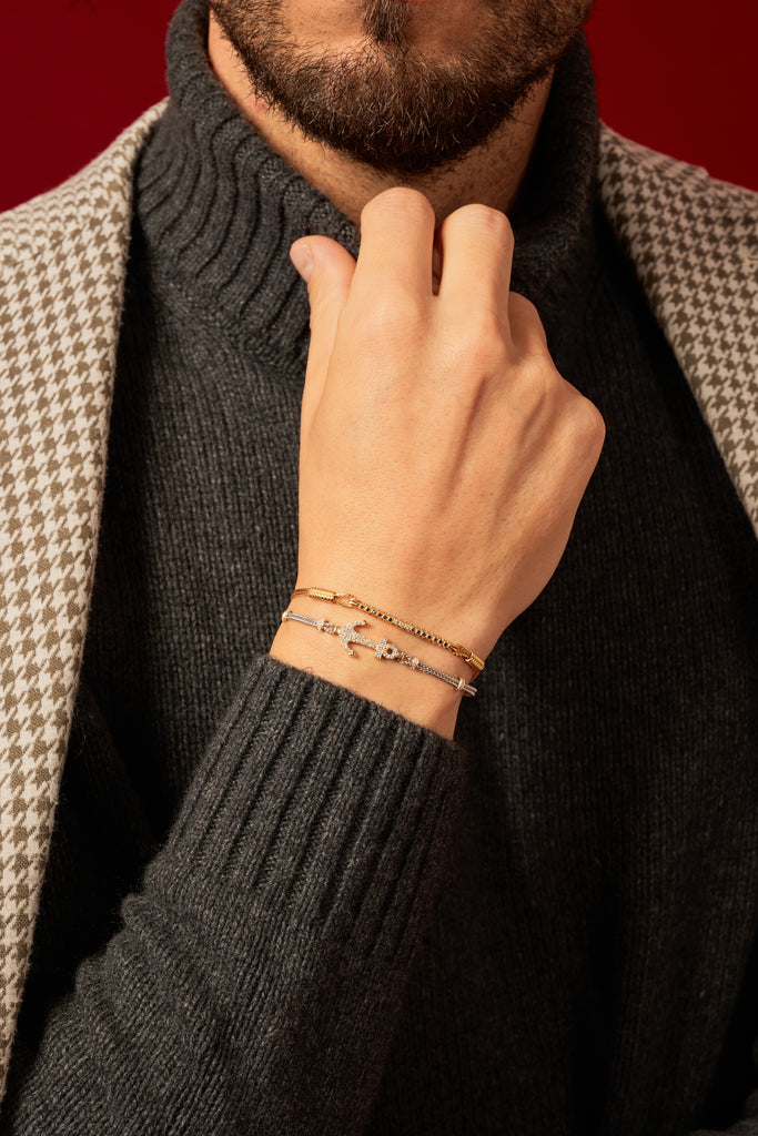 BRACCIALE RIGIDO BICOLORE IN ORO BIANCO E GIALLO CON ANCORA DI