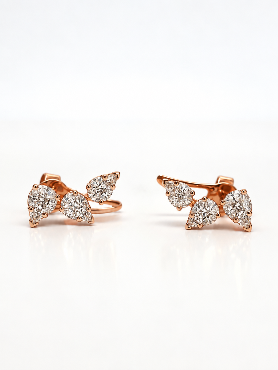 ORECCHINO FANTASIA IN ORO ROSA CON DIAMANTI E BAGUETTE
