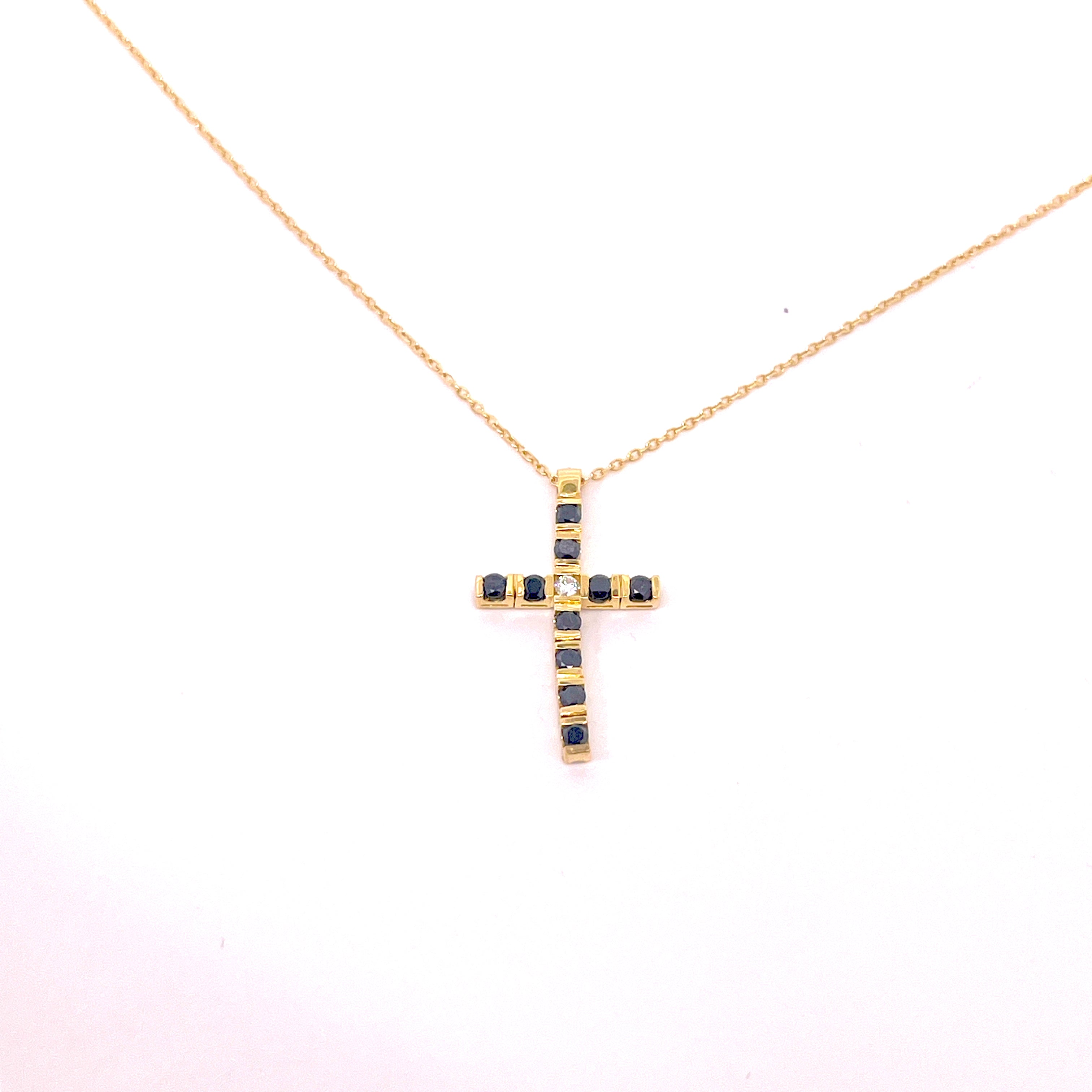 CROCE IN ORO GIALLO CON DIAMATNI BIANCHI E NERI COMPRESA DI CATENINA