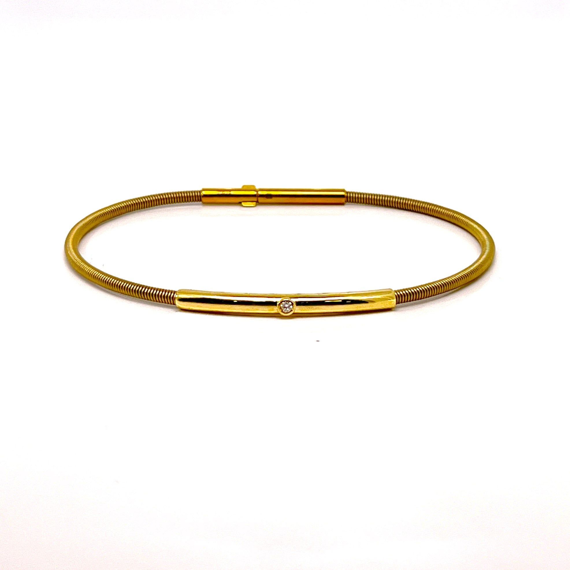 BRACCIALE IN ORO GIALLO CON BACCHETTA E UN DIAMANTINO CENTRALE