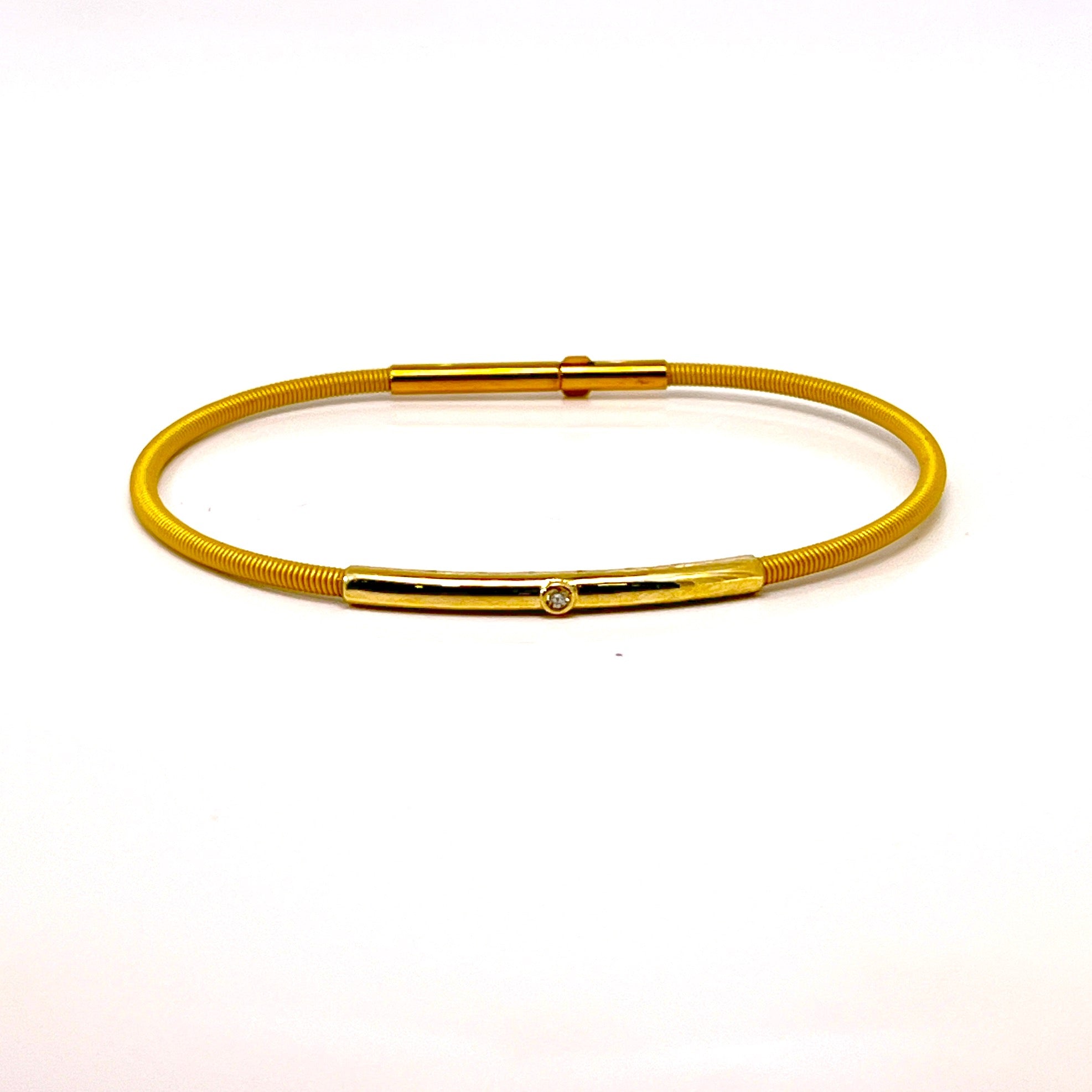 BRACCIALE  IN ORO GIALLO CON BACCHETTA E UN DIAMANTINO CENTRALE