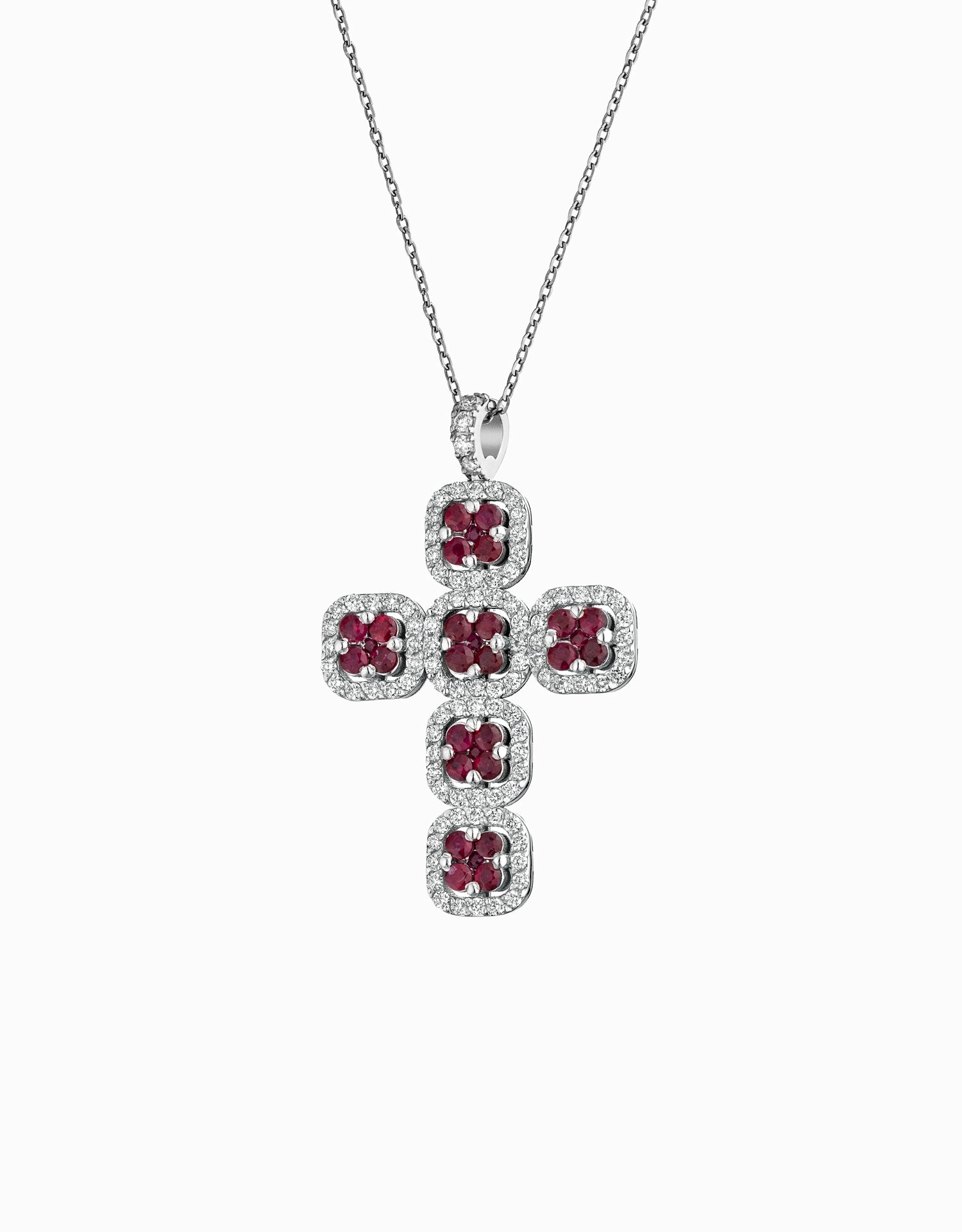 CROCE IN ORO BIANCO, CON DIAMANTI LATERALI E RUBINI CENTRALI