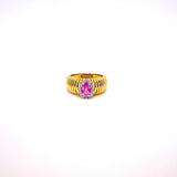 ANELLO FASCIA IN ORO GIALLO CON CENTRALE GOCCIA DI DIAMANTI E ZAFFIRO ROSA
