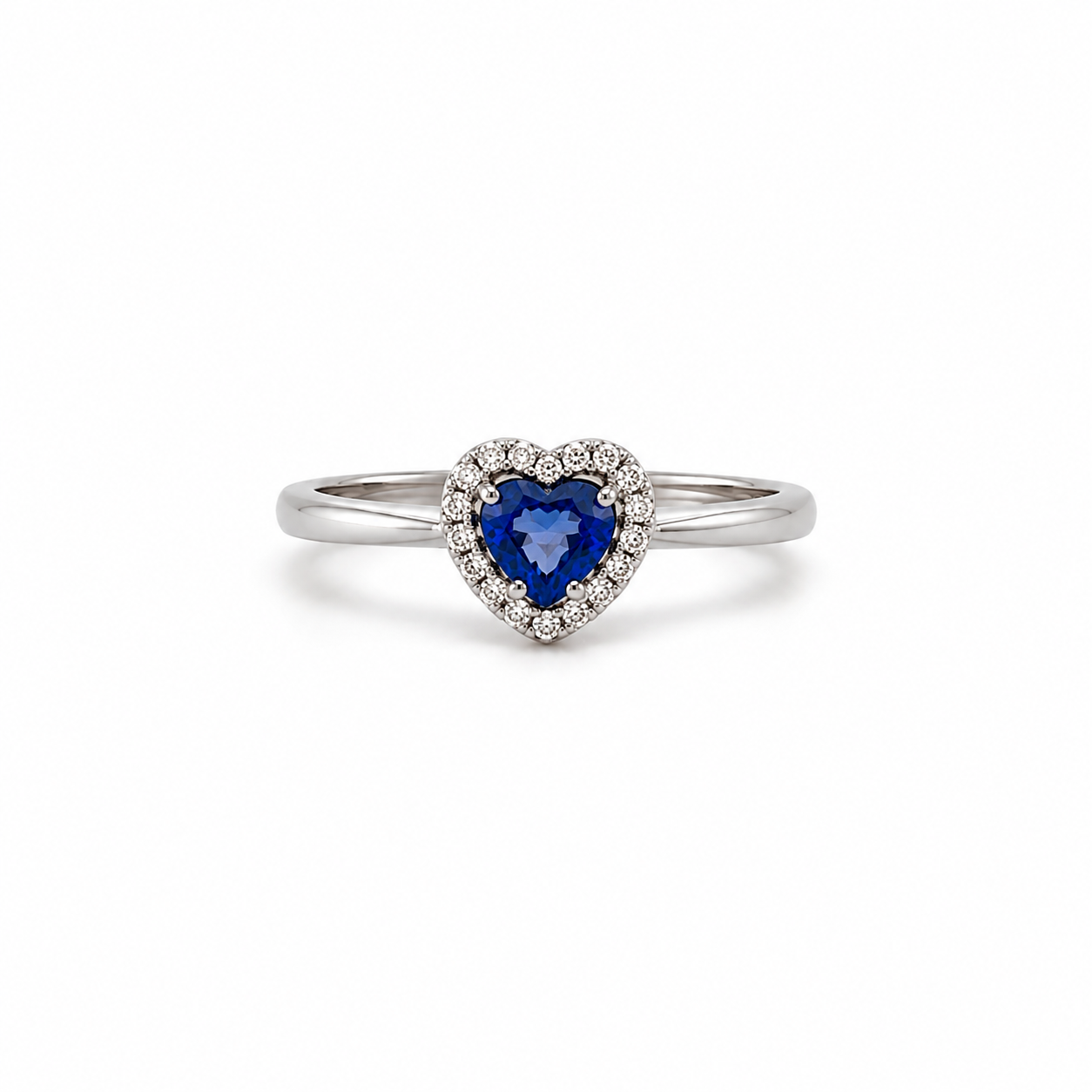 ANELLO IN ORO BIANCO , CON DIAMANTI E CUORE DI ZAFFIRO CENTRALE