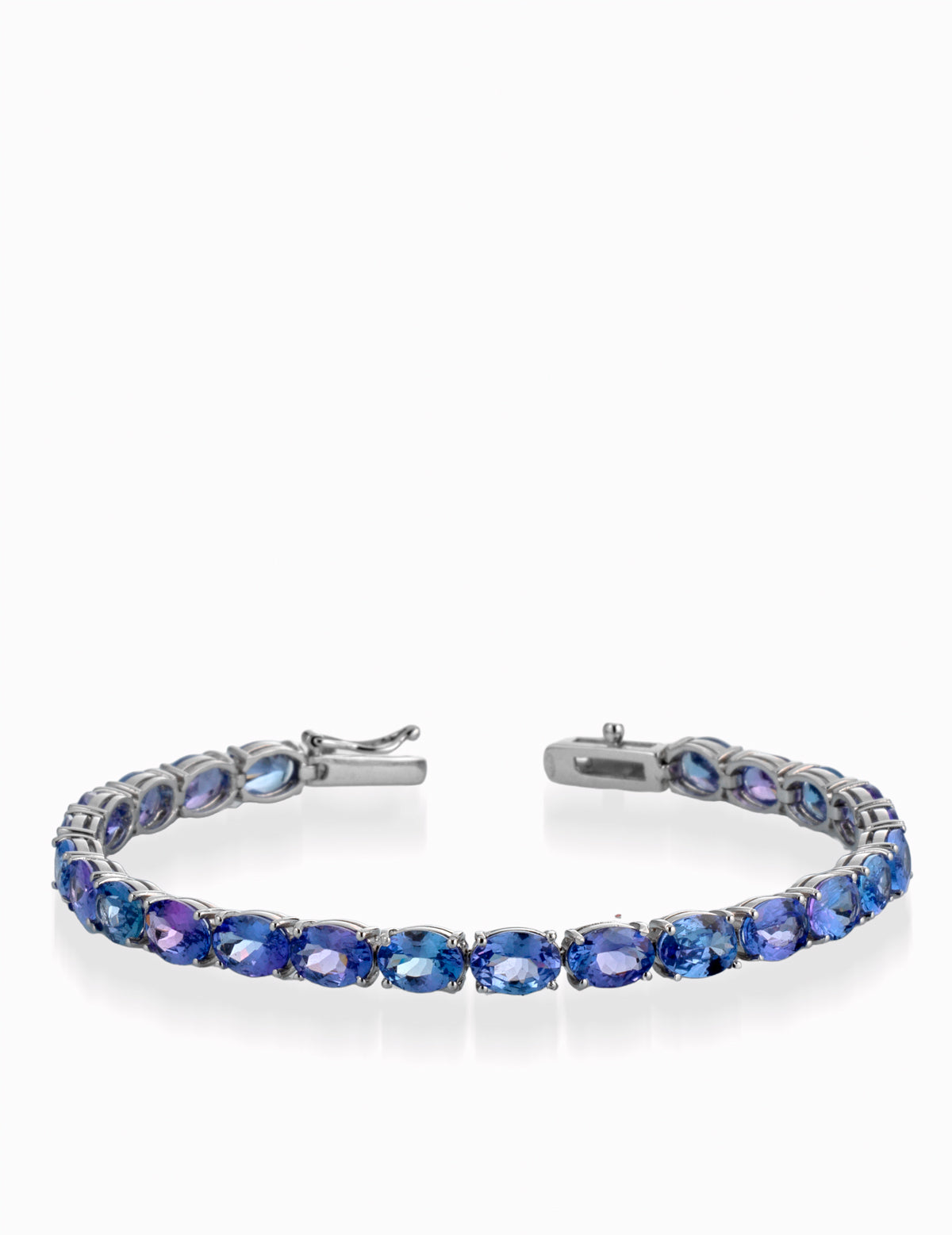 BRACCIALE CON OVALI IN ORO BIANCO E PIETRE DI TANZANITE