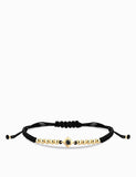 BRACCIALE  LACCIO IN ORO GIALLO CON  PUNTO LUCE DI DIAMNTE NERO CENTRALE