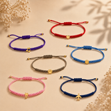 BRACCIALE CORDINO BLU CON AEREO IN ORO GIALLO