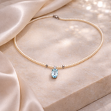 COLLANA PERLE IN ORO 9KT, CON DIAMANTINO E ACQUAMARINA OVALE CENTRALE