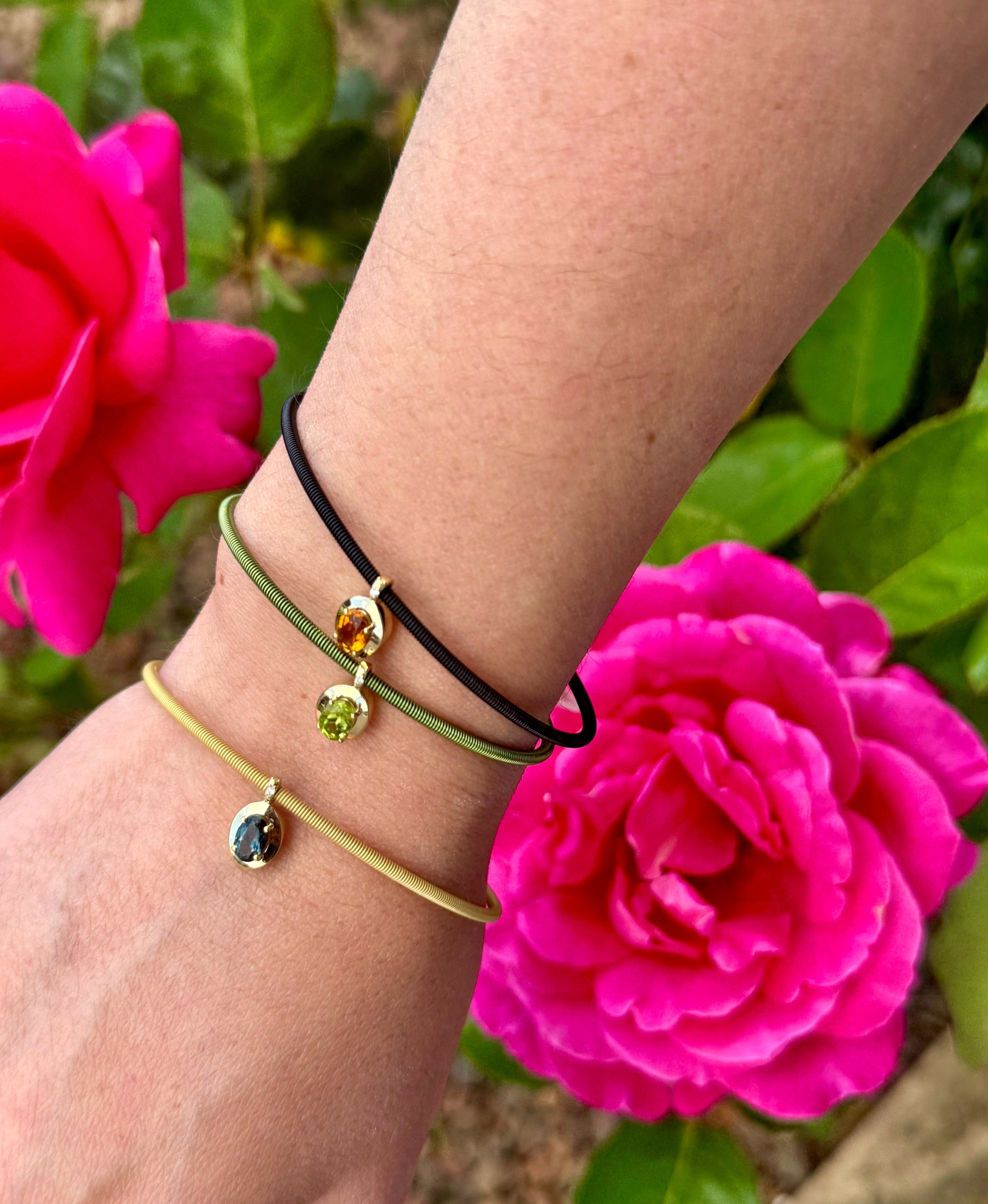 BRACCIALE IN ORO ROSA CON CINUTIRNO NERO IN ORO ROSA CON OVALE COLORATO E DIAMANTI