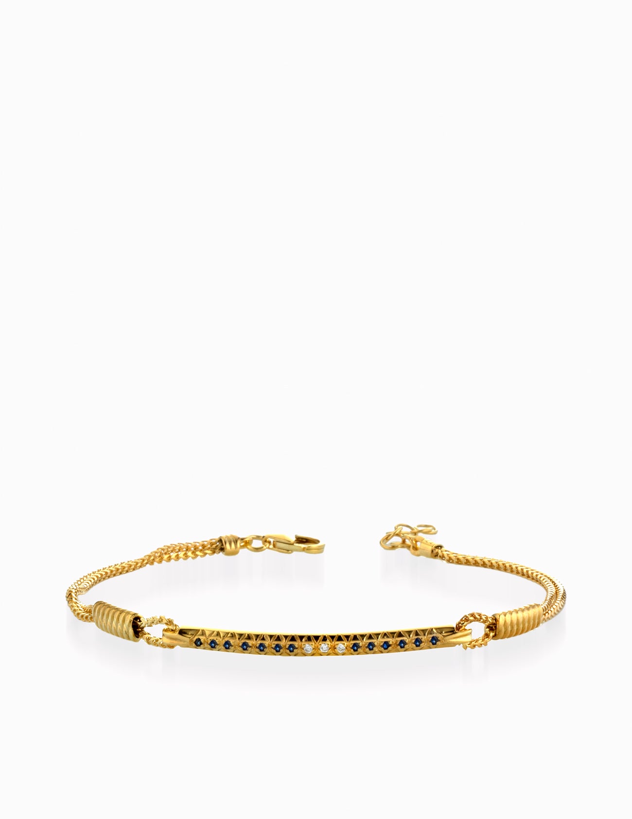 BRACCIALE IN ORO GIALLO CON CATENA E BACCHETTA CENTRALE DI DIAMANTI E ZAFFIRI